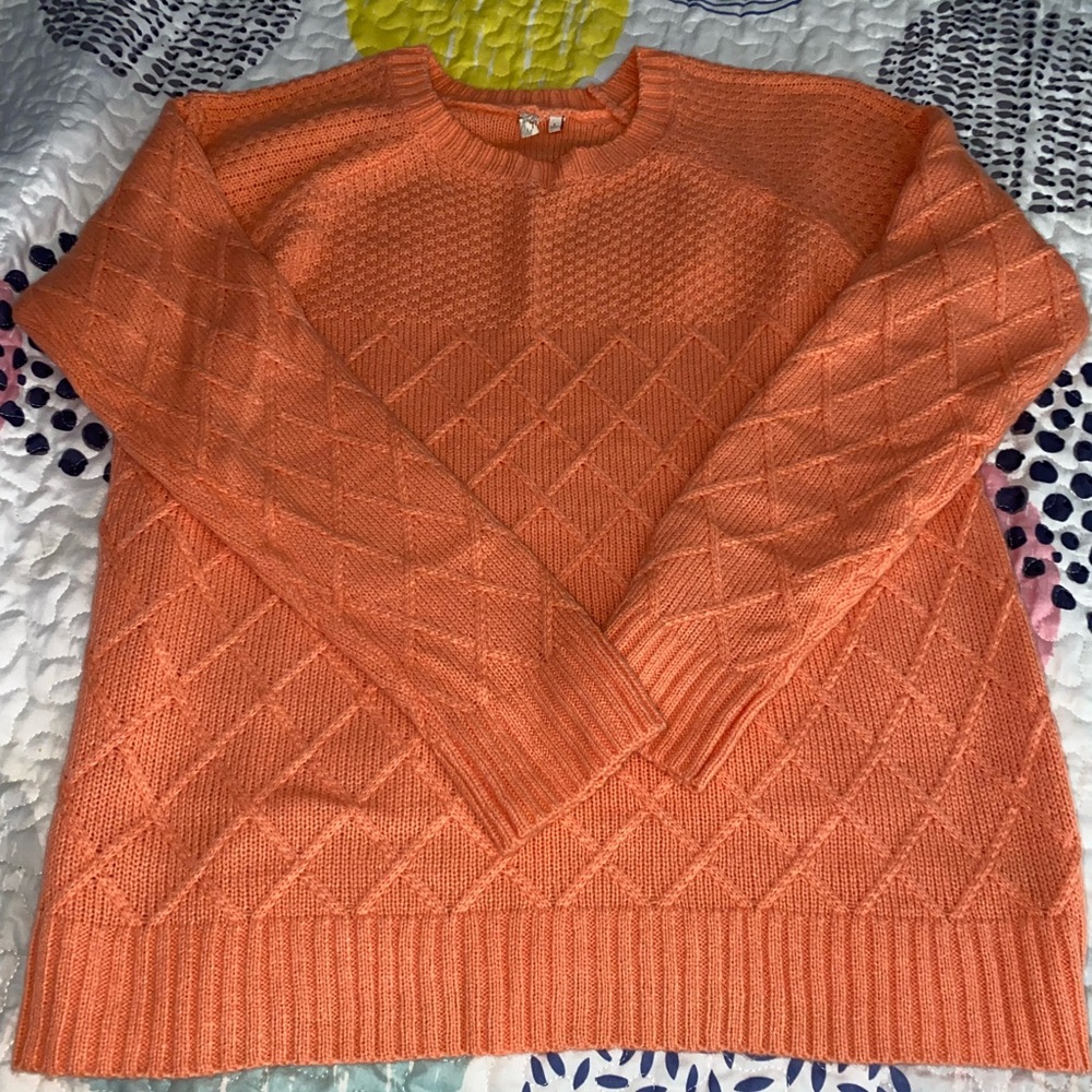 Large Red Camel Sweater Coral in color
